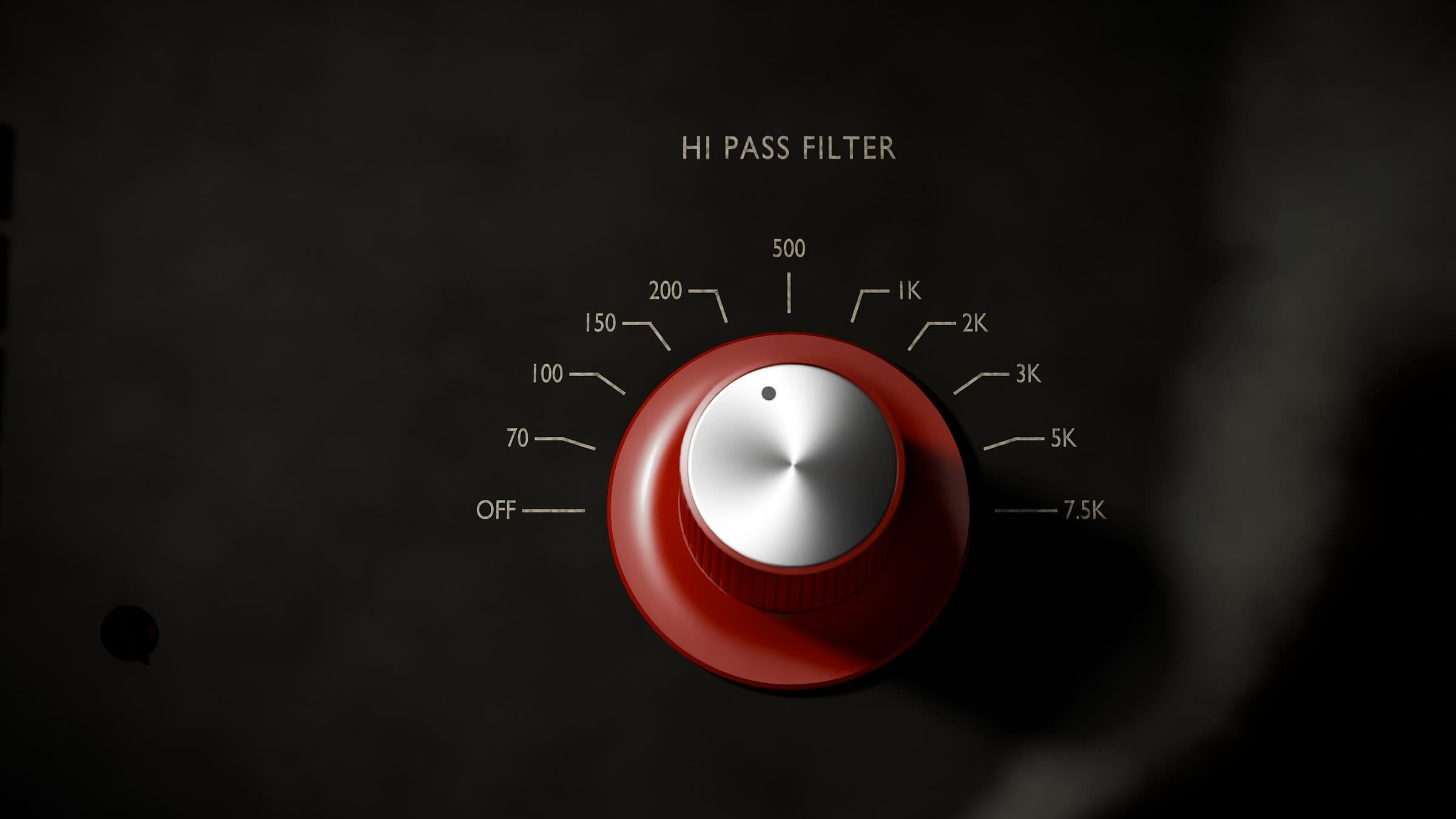 The red HI PASS FILTER knob seen from above on a dark charcoal panel, its spun aluminium cap catching the light, with the dial steps OFF, 70, 100, 150, 200, 500, 1K, 2K, 3K, 5K and 7.5K around it.